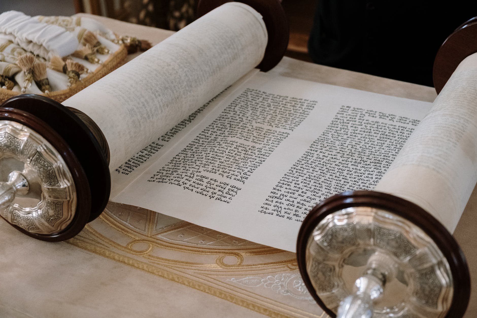 a close up shot of a sefer torah